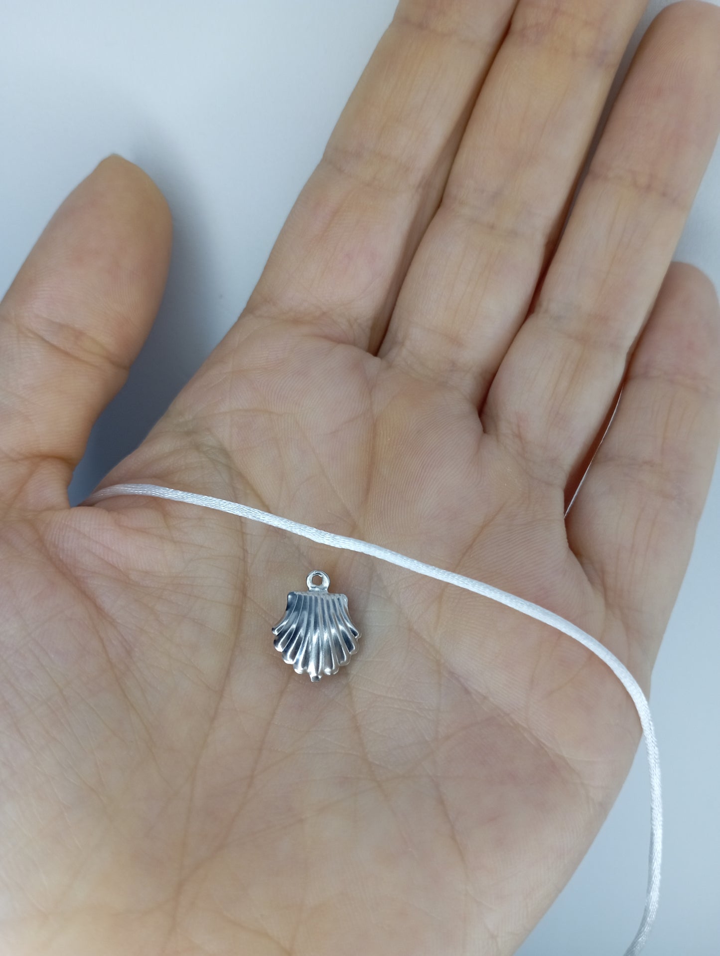 Collana Ariel con conchiglia π